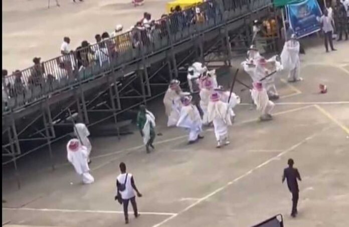 Eyo Festival Masquerades Beating Man