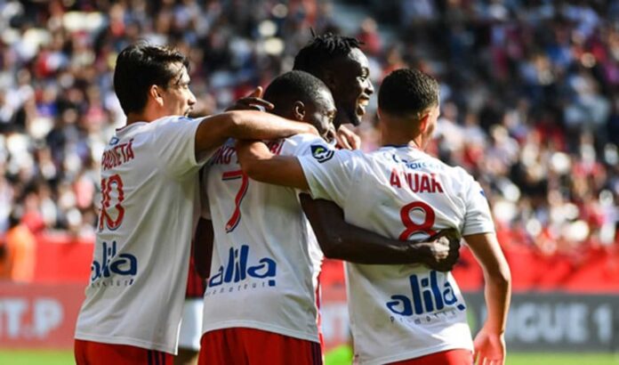Lyon Soccer Team Celebrating Goal