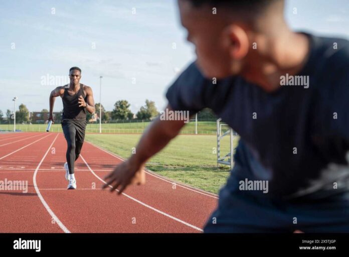 Nigerian Athletes Running Relay Race