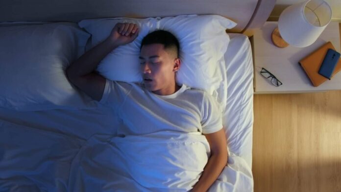 Man Snoring Sleep Study Hypertension